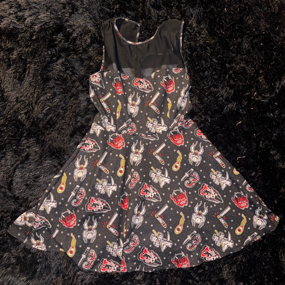 Sourpuss Black Strapless Fit-and-Flare Dress with Red & Yellow Graphic Print